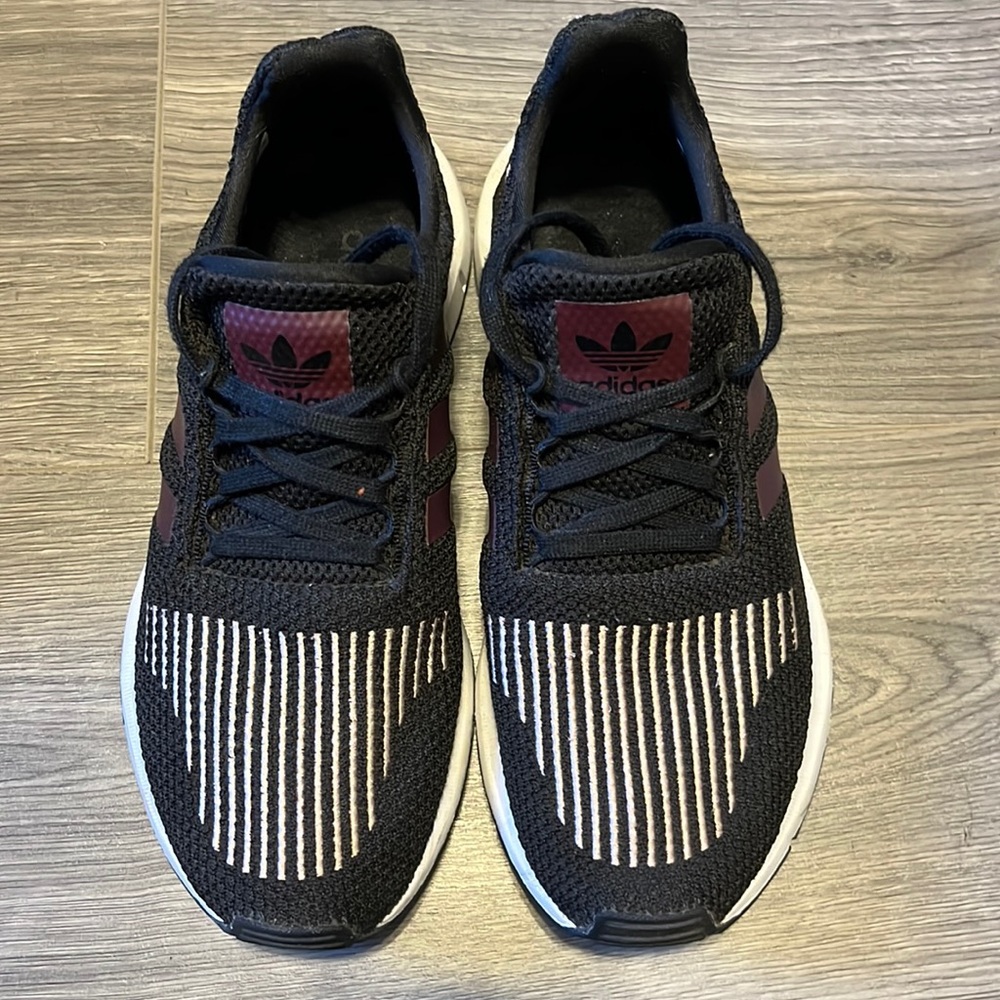 Adidas tennis shoes. Only wore a couple of times, like new.